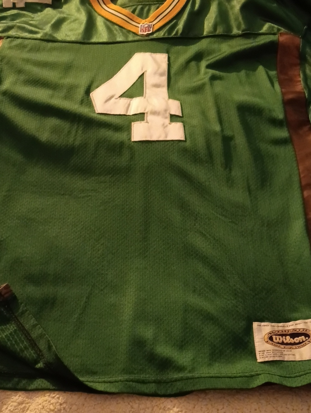 Wilson Men’s Green Jersey with White Number 4 and Gold Trim